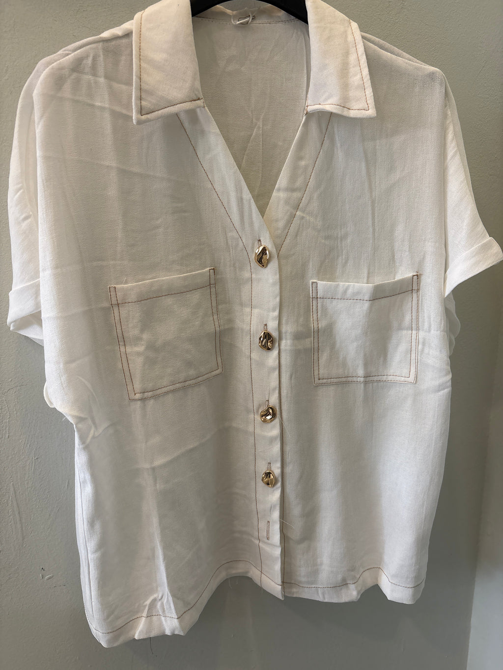 Blusa botones dorados