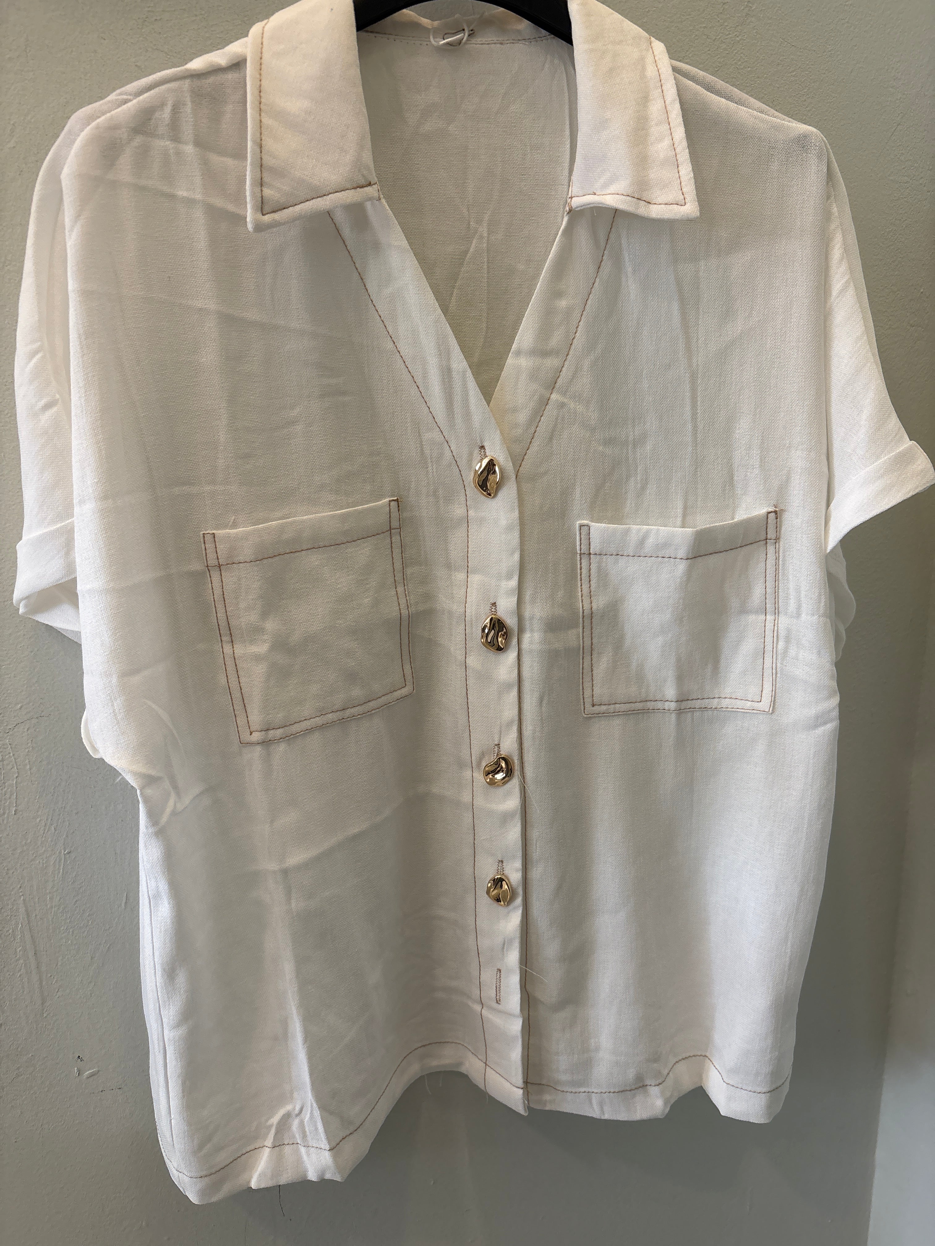 Blusa botones dorados