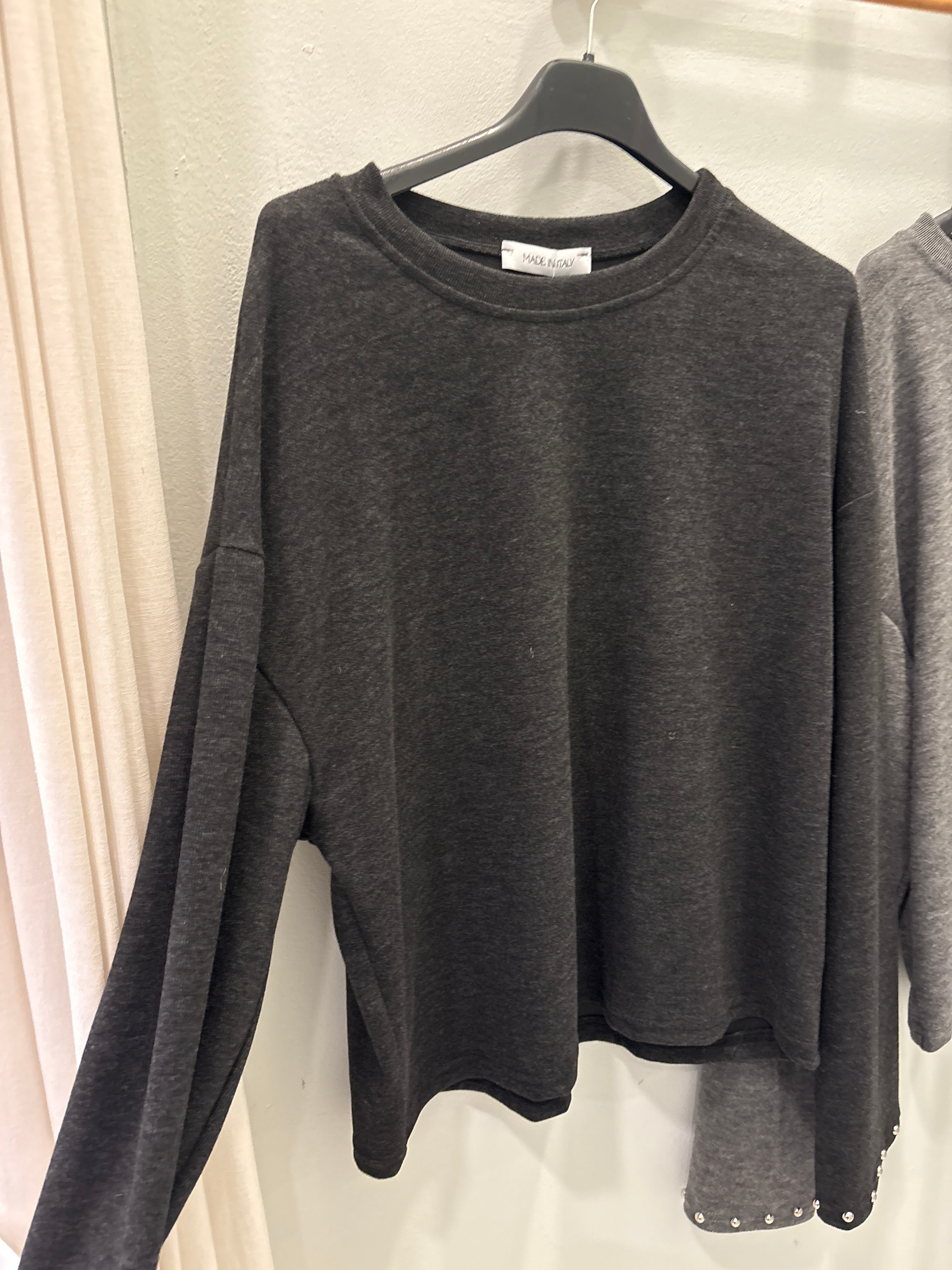 Jersey fino tachuelas